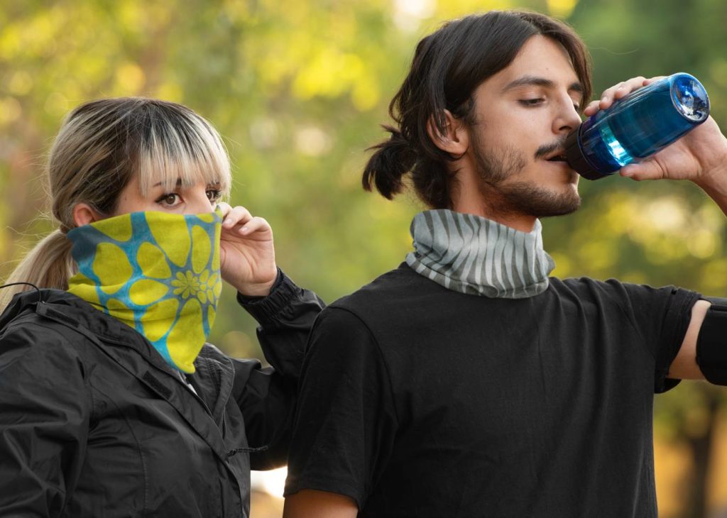 mockup of a man and a woman wearing neck gaiters 36145